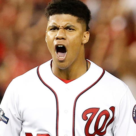 Juan Soto reacts after hitting a three-run go ahea