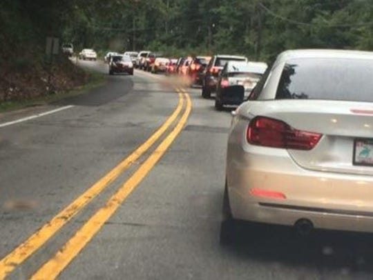 Traffic on Sweeten Creek Road tends to back up in the two lane sections. A widening project has been delayed several times.