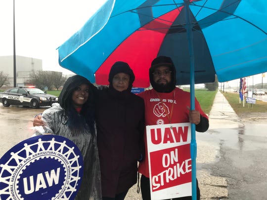 Ghana Goodwin-Dye, former president of UAW Local 909, is on a picket line on Mound Road near the closed GM Warren Transmission plant on Oct. 2, 2019. Goodwin-Dye, center, is standing with Angela Powell, a Ford-UAW worker, and Gary Grant, a UAW worker at Fiat Chrysler Automobiles.