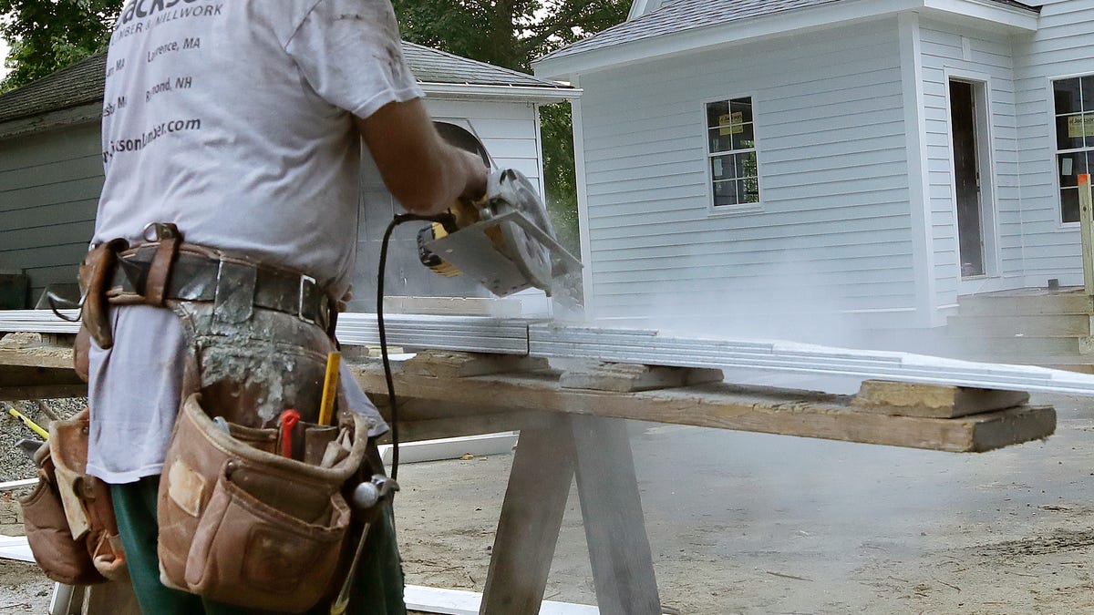 In this Wednesday, Oct. 2, 2019, photo, a carpenter works on a construction site in North Andover, Mass. On Thursday, Oct. 3, the Institute for Supply Management, a trade group of purchasing managers, issues its index of non-manufacturing activity for September.