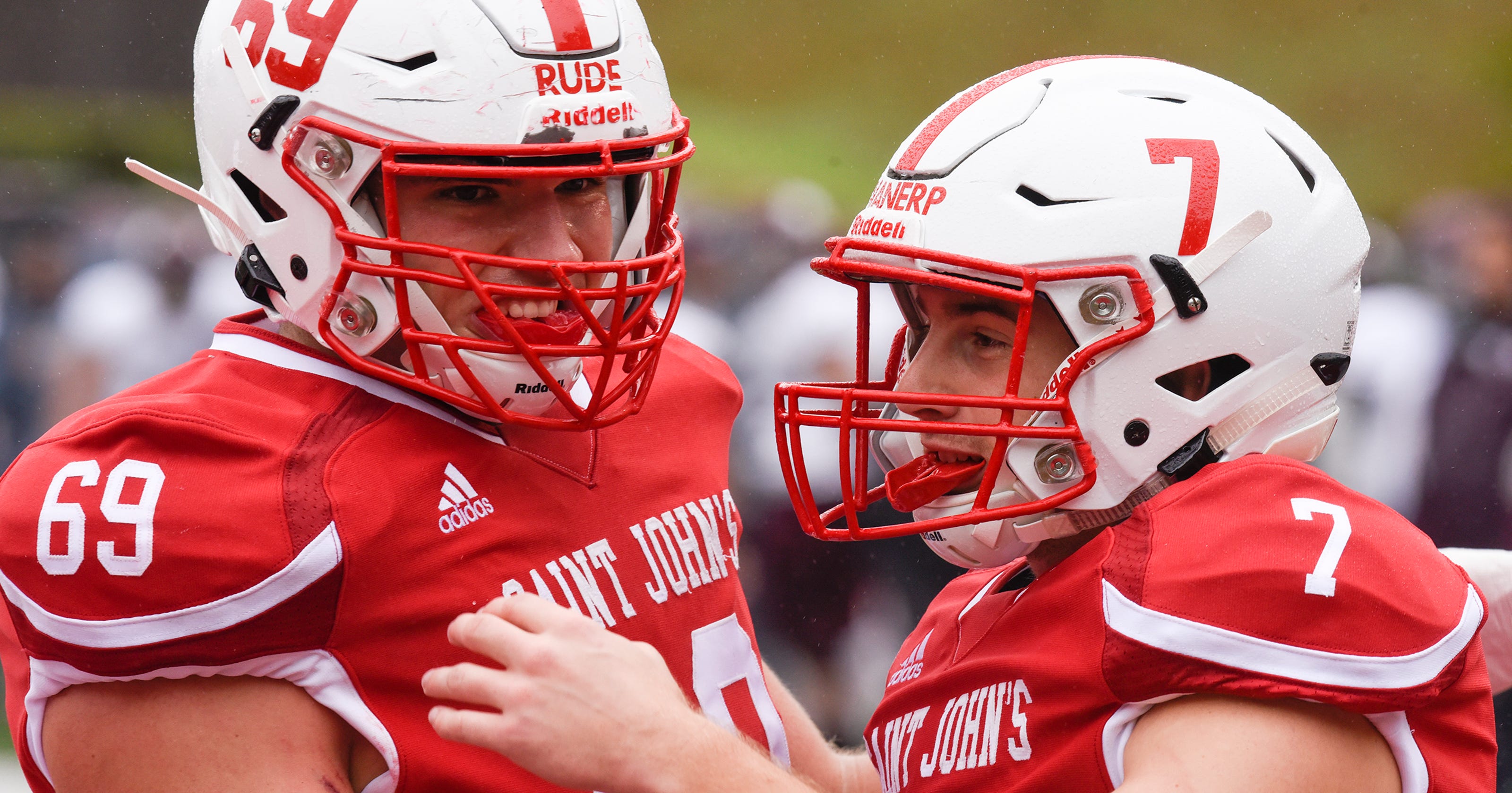 St. John's University football Johnnies celebrate with win