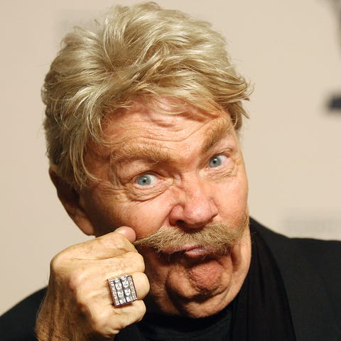 Rip Taylor poses for a picture at the premiere of 