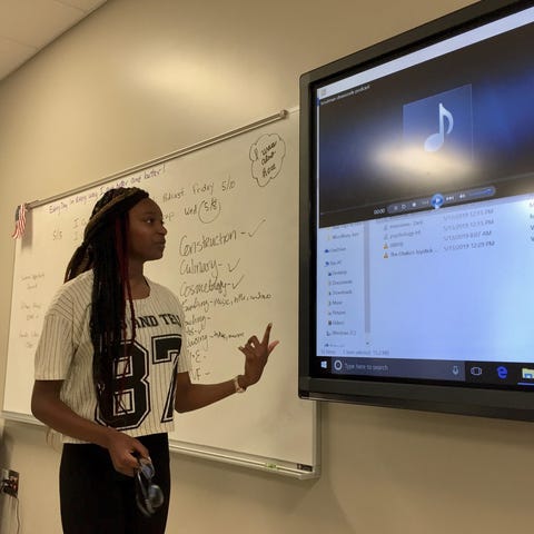 Jy'Nivea Troutman presents her podcast to her clas