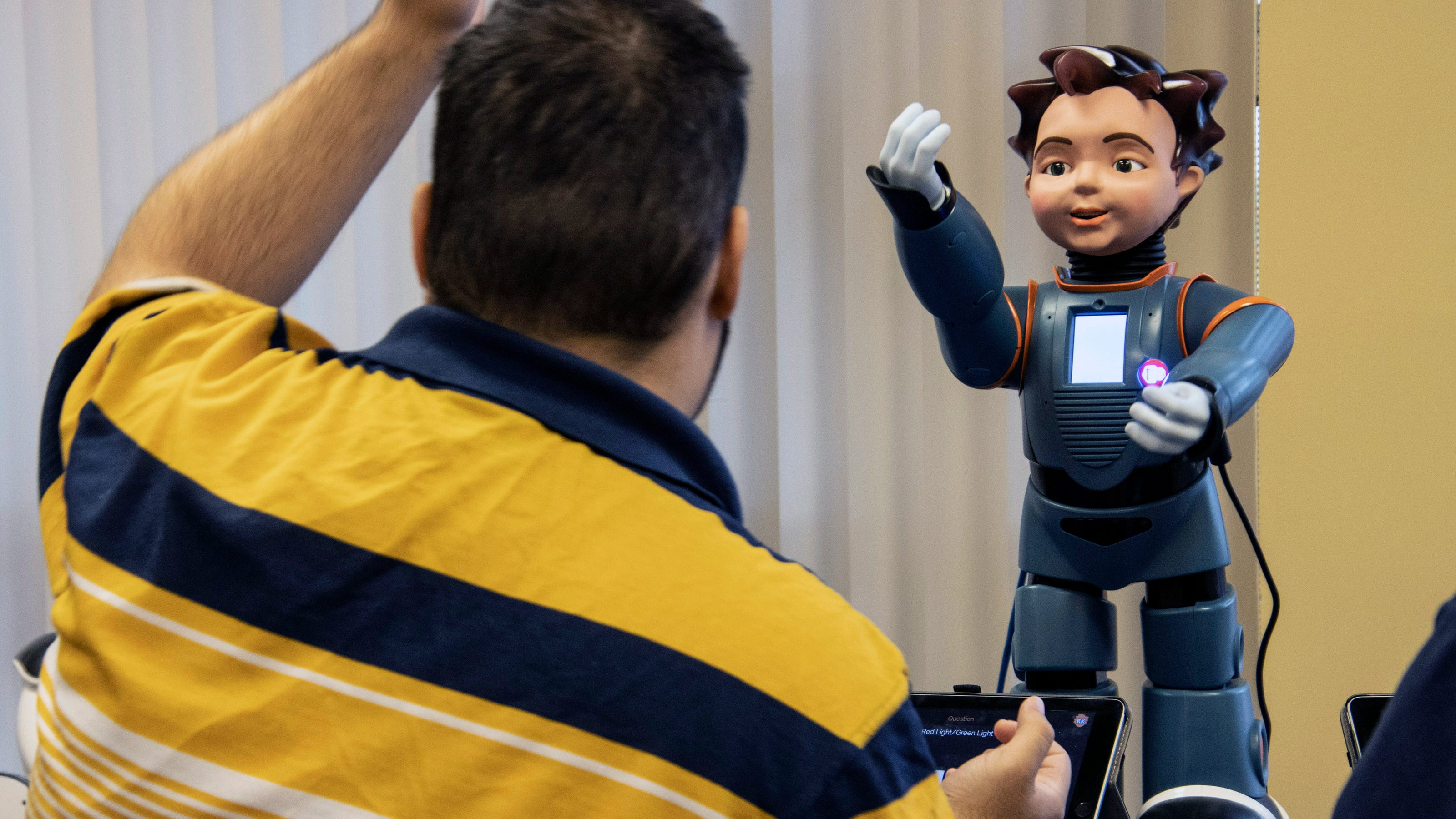 Autism patients are using robots learn communication skills