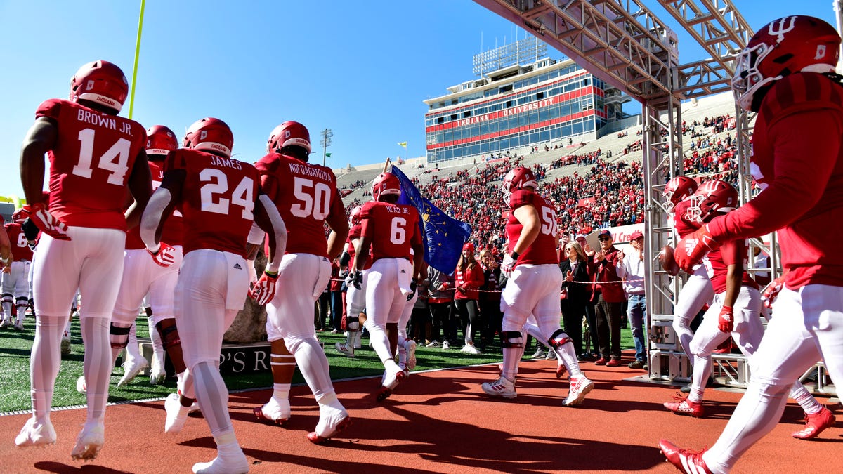 The Indiana Hoosiers enter the field before the game against the Rutgers Scarlet Knights at Memorial Stadium.