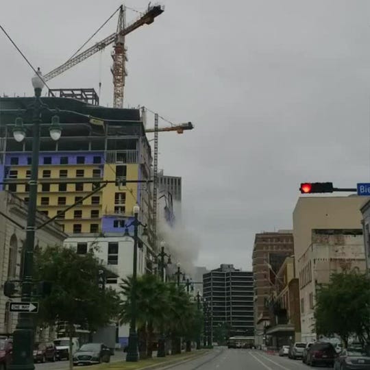 Download Hard Rock Hotel collapse: Work starts to bring down cranes ...