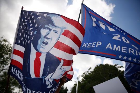 President Donald Trump's supporters protest ahead of House Speaker Nancy Pelosi's address on Oct. 3, 2019, in Weston, Florida.