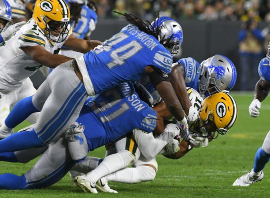 The Packers' Darrius Shepherd is brought down by the Lions defense in the third quarter Monday night at Lambeau Field in Green Bay, Wisconsin.