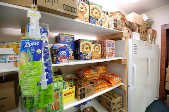 Stocked shelves of food Thursday, October 17, 2019 at the food pantry in Lighthouse Christian Church at 401 south National Ave in Fond du Lac, Wisconsin. Doug Raflik/USA TODAY NETWORK-Wisconsin