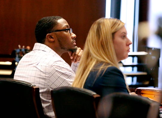 In this Wednesday, Oct. 23, 2019 photo, defendant Khalil Wheeler-Weaver listens to opening arguments during his triple murder trial in Newark, N.J. Wheeler-Weaver is charged with strangling and asphyxiating three women in the fall of 2016. Heâ€™s also accused in the attempted murder of a fourth woman.