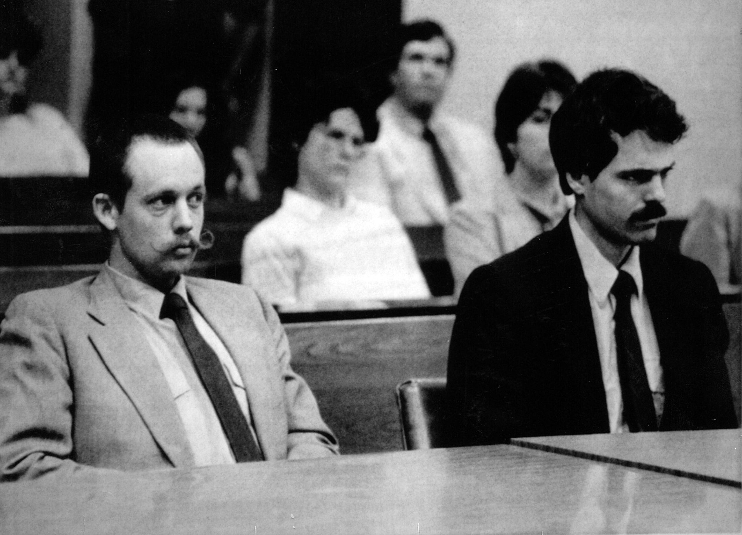 Doug Ammerman and Michael Holwell sit in Leon County Court during a Bond Reduction hearing. The pair have been charged with child abuse in the case of the "unknown children." Bond was reduced from $100,000 each to $20,000 each.