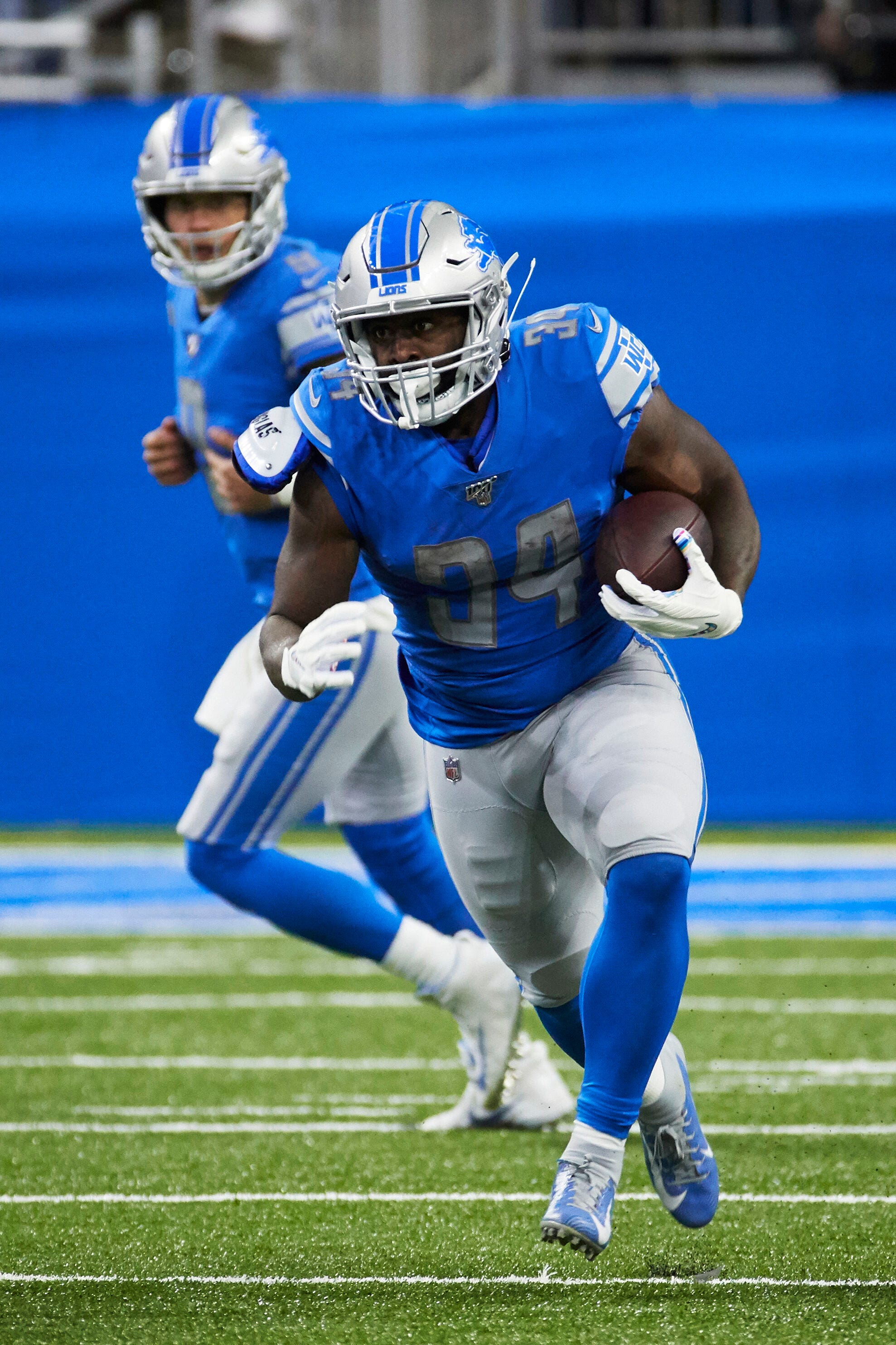 DETROIT, MI - OCTOBER 20: Detroit Lions TE T.J. Hockenson (88) gets  sandwiched between Minnesota Vikings S Anthony Harris (41) and Minnesota  Vikings S Harrison Smith (22) during NFL game between Minnesota