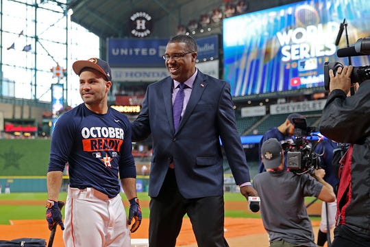 Jose Altuve of the Houston Astros jokes with ESPN analyst Eduardo Perez during batting practice prior to Game 3 of the 2017 World Series against the Los Angeles Dodgers at Minute Maid Park on Friday, October 27, 2017 in Houston, Texas.