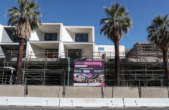 A sign indicates that the Andaz Palm Springs project will be open in late 2019, however work has stalled on the downtown Palm Springs hotel, November 1, 2019.  