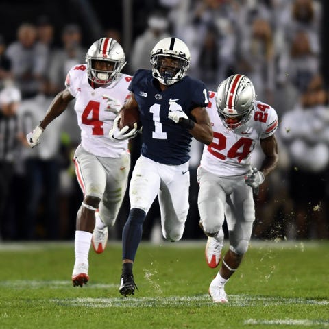 Penn State wide receiver KJ Hamler breaks free fro