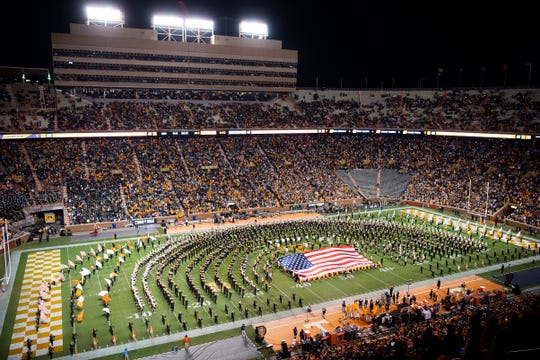 Lee Greenwood performs alongside The Pride of the Southland Band and Alumni Band at halftime during a game between Tennessee and UAB at Neyland Stadium in Knoxville, Tenn. on Saturday, Nov. 2, 2019.