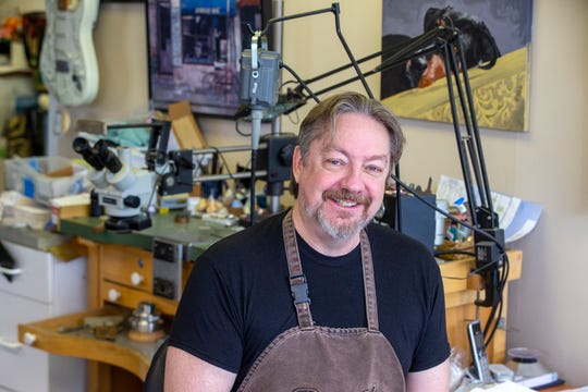 Joel McFadden, owner of The Art of Jewelry, a Red Bank-based business that designs and sells jewelry, poses at his business in Red Bank, NJ Tuesday, November 5, 2019. 