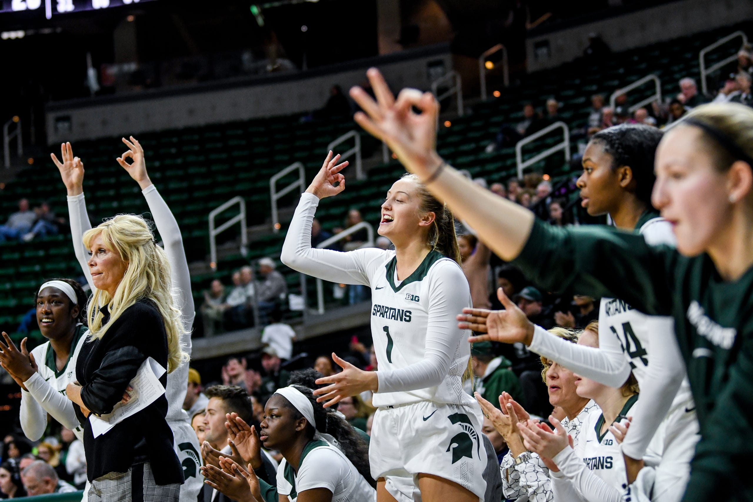 Michigan State's bench reacts after teammate Alyza Winston makes a 3-pointer during the third quarter on Tuesday, Nov. 5, 2019, at the Breslin Center in East Lansing.