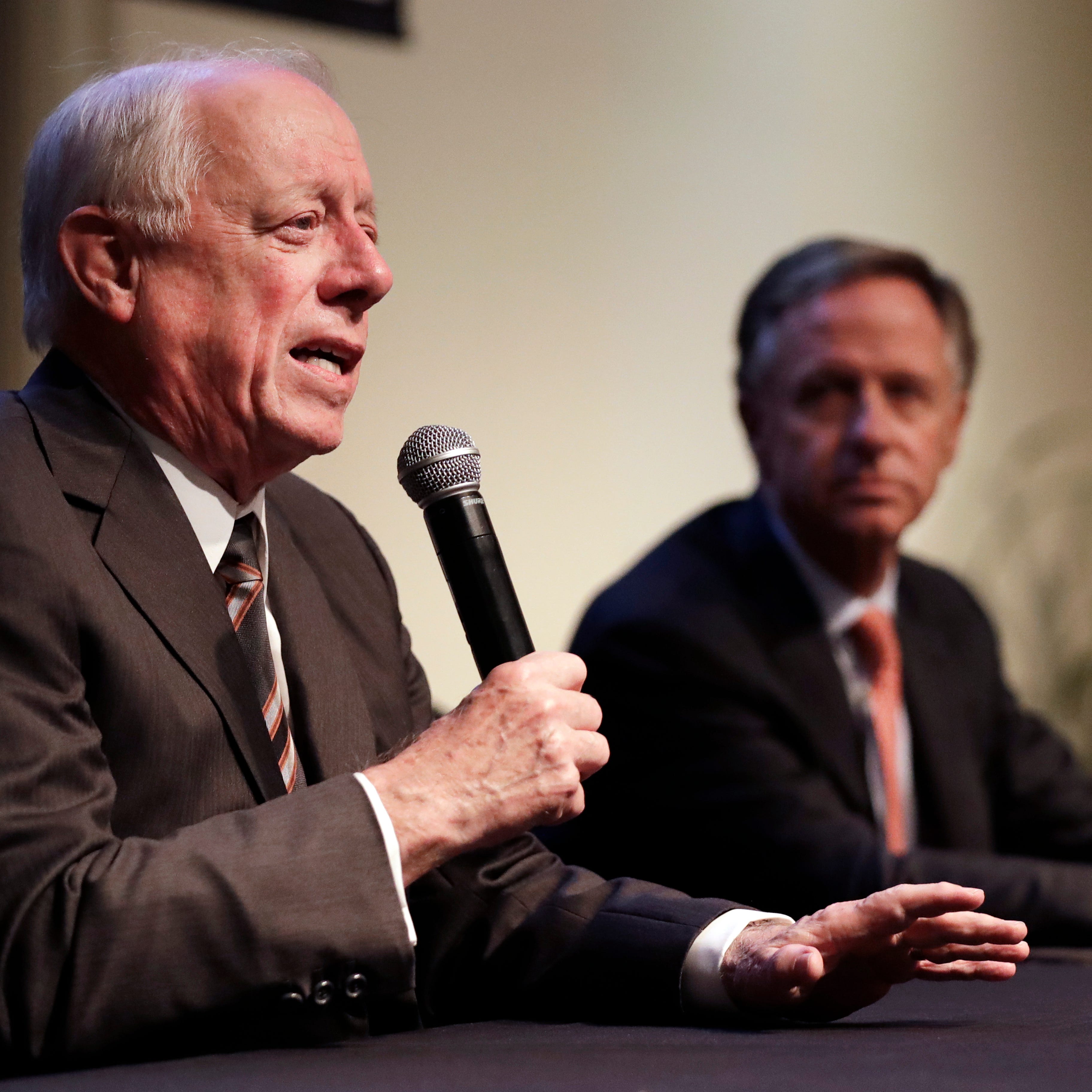 Former Democratic Gov. Phil Bredesen, left, answers a question during a discussion on bipartisanship at Vanderbilt University Tuesday, Nov. 5, 2019, in Nashville, Tenn. At right is former Republican Gov. Bill Haslam. (AP Photo/Mark Humphrey)