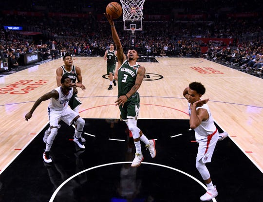 George Hill Makes Big Imprint On Bucks On The Court And In