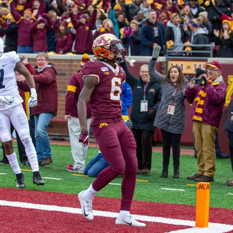 Minnesota wide receiver Tyler Johnson celebrates s