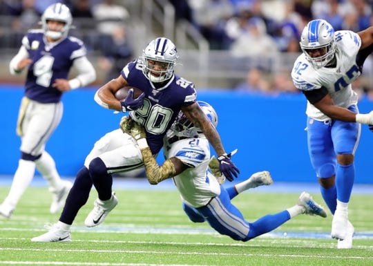 Lions defensive back Tracy Walker tackles Cowboys running back Tony Pollard during the first half on Sunday, Nov. 17, 2019, at Ford Field.