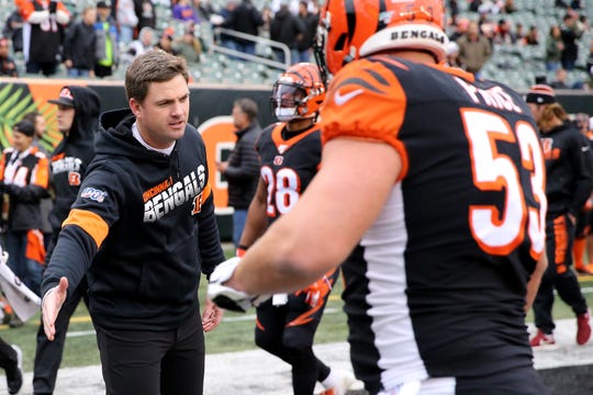 Cincinnati Bengals head coach Zac Taylor encourages the team as they come off the field before kickoff of a Week 13 NFL game against the New York Jets, Sunday, Dec. 1, 2019, at Paul Brown Stadium in Cincinnati. 