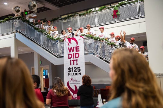 The NMSU Roadrunner Revue, along with NMSU Foundation employees and NMSU dignitaries, celebrate the $125 million Ignite Aggie Discovery campaign at the closing of the 2019 Giving Tuesday event at Corbett Center Student Union on Dec. 3, 2019.