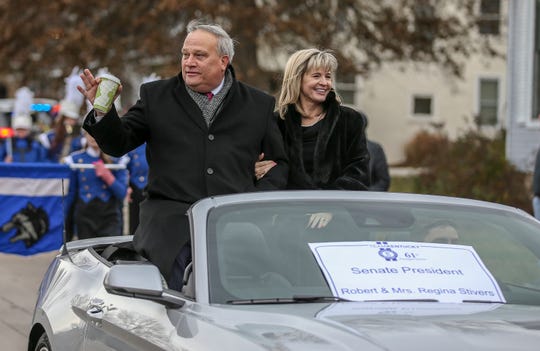 Senate President Robert Stivers and wife, Regina Stivers, ride along Capital Avenue in the Inaugural Parade for Andy Beshear.