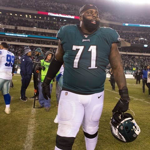 Eagles' Jason Peters walks the field after after d