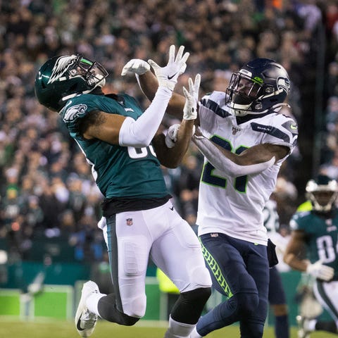 Eagles' Shelton Gibson watches a pass come in as h