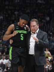 Michigan State point guard Cassius Winston (5) has a chance to become the first college player to finish with more than 2,000 points and 1,000 assists.