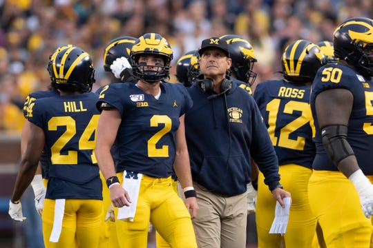 Shea Patterson and Jim Harbaugh