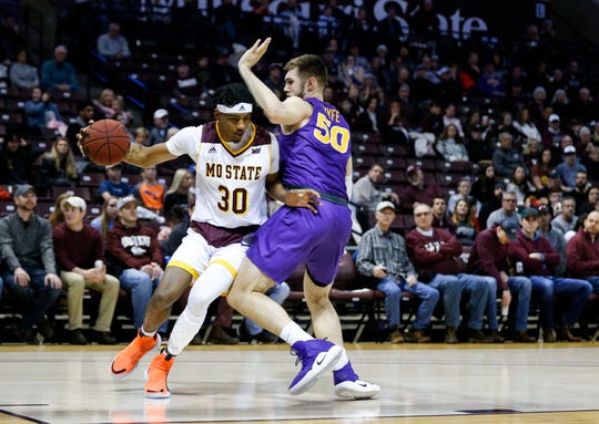 Missouri State Bears forward Tulio Da Silva (30) drives to the lane around Northern Iowa Panthers forward Austin Phyfe (50) during a game at JQH Arena in Springfield, Mo. on Saturday, Jan. 11, 2020.