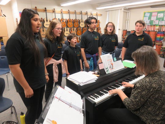 Six members of Cedar Bluff Middle School’s vocal ensemble practice at the school on Jan. 22, 2020, while teacher Edie Taylor leads them on the keyboard. From left are Noor Alsaadun, Ari Rathe, Solomon Murakami, Allan Rodriguez, Kate Crass and Ian Beatty. The group performed at the Mighty Musical Monday program at the Tennessee Theatre in December.