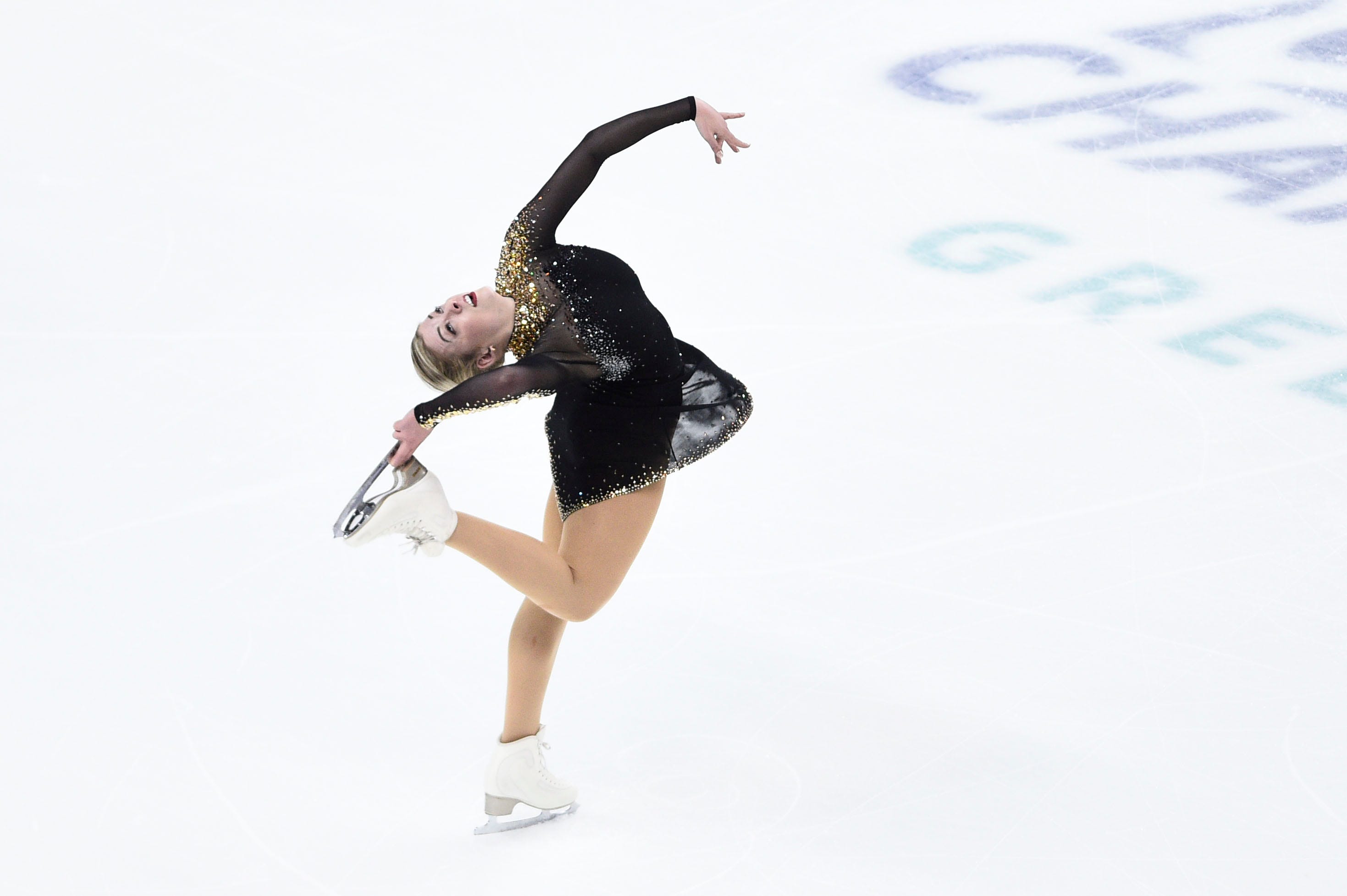 black and gold figure skating dresses