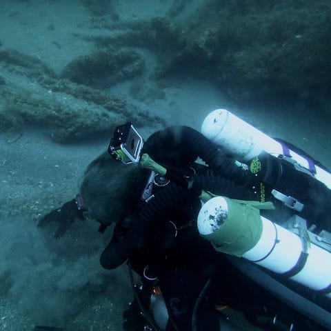 Michael Barnette searches the wreck of the SS Coto