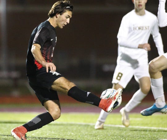 Leon senior Henry Regalado dribbles as Leon's boys soccer team beat Ocala Forest 6-0 in the District 2-6A final on Feb. 7, 2020