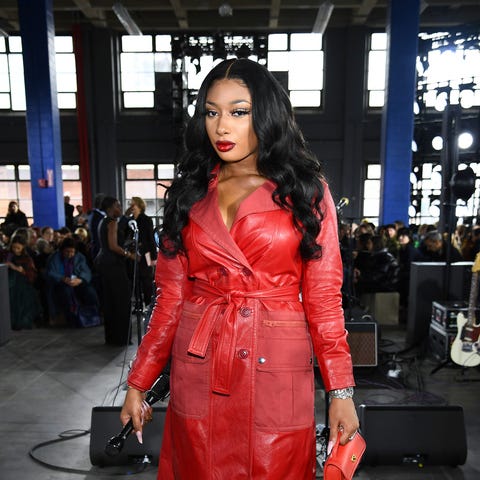 Megan Thee Stallion posed in a red outfit at the C