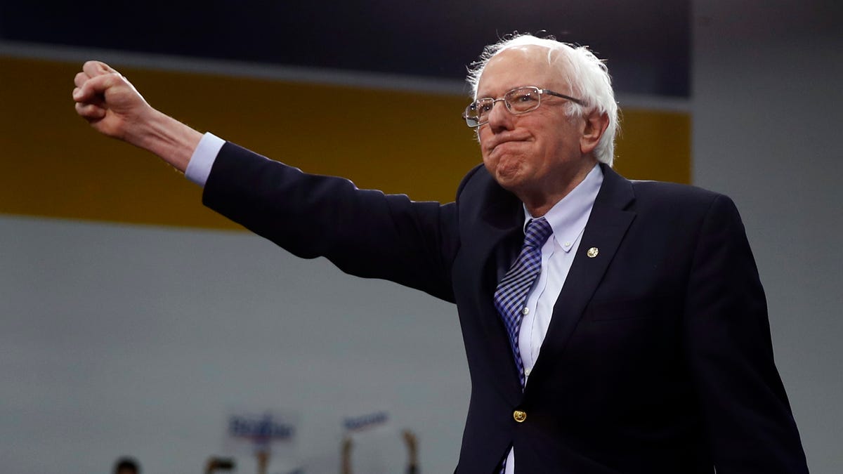 Democratic presidential candidate Sen. Bernie Sanders, I-Vt., arrives to speak to supporters at a primary night election rally in Manchester, N.H., Tuesday, Feb. 11, 2020. (AP Photo/Matt Rourke)