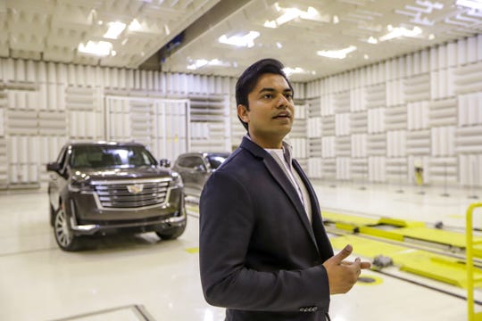 Sound Engineer Jigar Kapadia tests sounds on new vehicles like the 2021 Cadillac Escalade in the anechoic chamber at the General Motors Proving Grounds on Saturday in Milford.