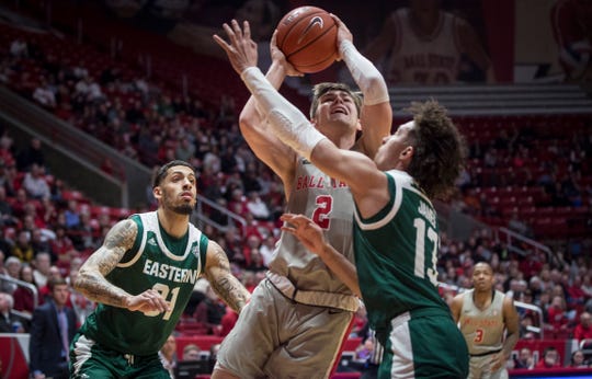 Ball State's Luke Bumbalough tries to get past Eastern Michigan University's defense on Feb. 22 during a home game at Worthen Arena. Ball State overtook Eastern Michigan 64-55.