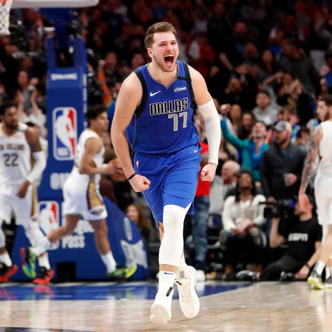 Luka Doncic reacts during overtime in the Maverick