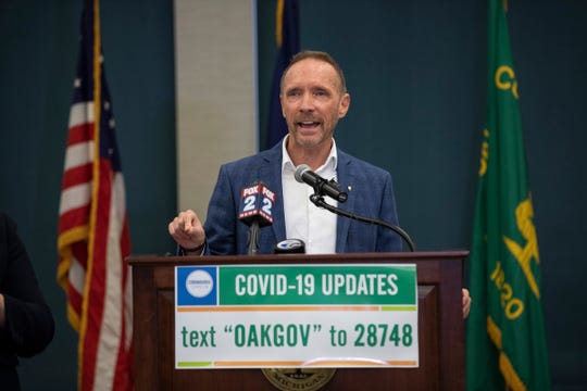 Oakland County Executive David Coulter gives an update on COVID-19 cases and response, March 21, 2020 at the L. Brooks Patterson Building Conference Center in Waterford.