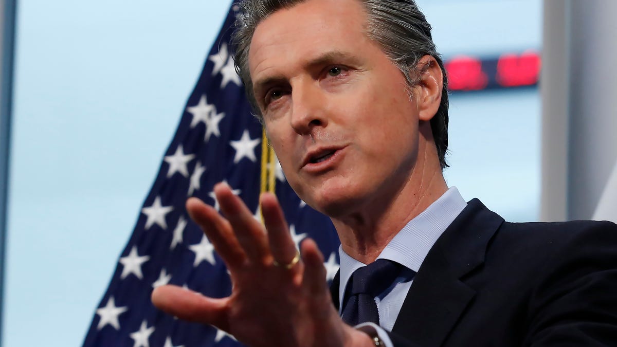 Newsom’s July 4 visit to West Michigan goes beyond supporting Biden, experts say