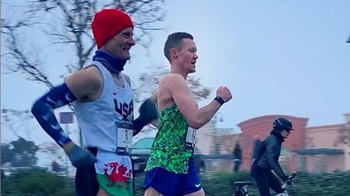 Chris Mosier (green) competes in the U.S. Olympic Trials for racewalking in January.