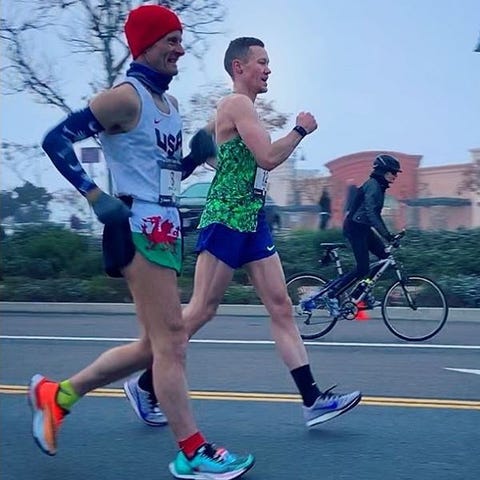 Chris Mosier (green) competes in the U.S. Olympic 