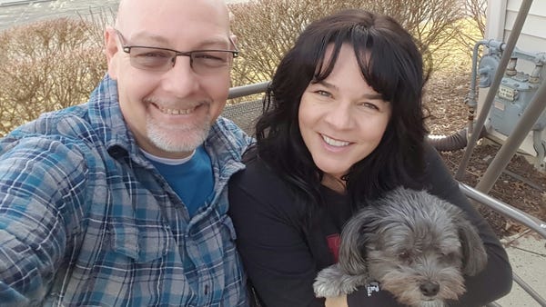 Kyle Brown, Pamela Dennen and their dog, Bear. Bro