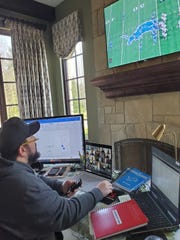 Lions coach Matt Patricia breaks down video of his team from last year in his makeshift office in his house.