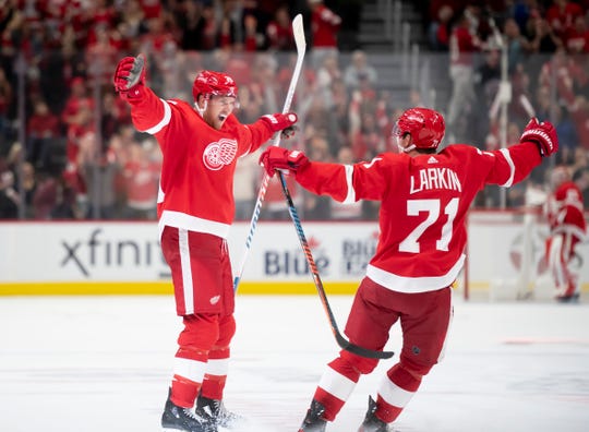 Anthony Mantha and Dylan Larkin celebrate Mantha's fourth goal against Dallas on Oct. 6.